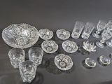 a lot of glass items that are on a table
