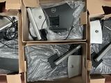 three boxes of electronic devices are sitting in a cardboard box