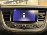 the dashboard of a car with a digital display in the center
