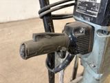 a close up of a machine with a handle on it