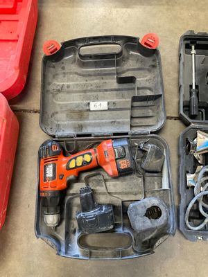 two tools in the case on the floor next to each other