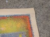 a picture of a piece of art on the ground