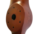 a brown fire hydrant that is on a white background