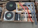 a wooden pallet with various tools on top of it