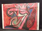 peinture représentant une œuvre abstraite rouge et noire sur fond noir