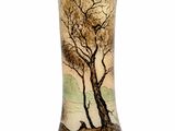 a vase with a painting of a tree on it