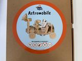 an image of a cardboard box with a picture of a dog driving a tractor