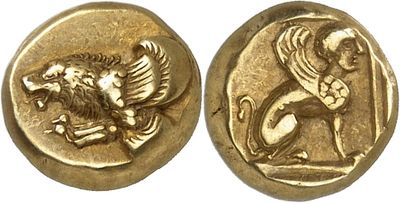 a gold coin with an image of a lion on it