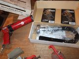 a box of tools sitting on a table next to a box of tools