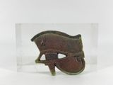 a small sculpture of a shoe in a clear box