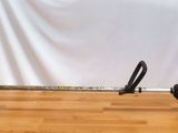 two tools that are sitting on a wooden floor