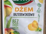 pouch of frozen peaches with a green cap on a table