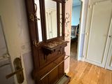 a mirror on the wall in the hallway of a house