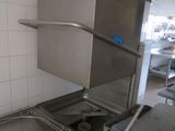 a kitchen with a sink, stove, and dishwasher in it