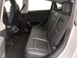 the back seats of a car are empty in the back of the car