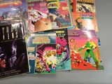 a lot of comic books that are on the table