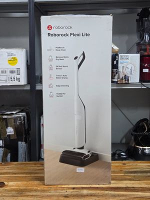 a cardboard box with a black and white vacuum on it