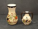 two small vases sitting next to each other on a table