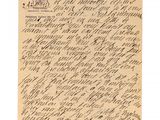 une lettre écrite en cursive sur une feuille de papier