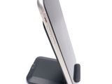 a close up of a cell phone on a stand