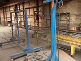 a blue machine that is sitting in the middle of a building