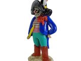 figurine of a man in a pirate costume holding a toothbrush