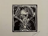 a black and white drawing of a man holding a book