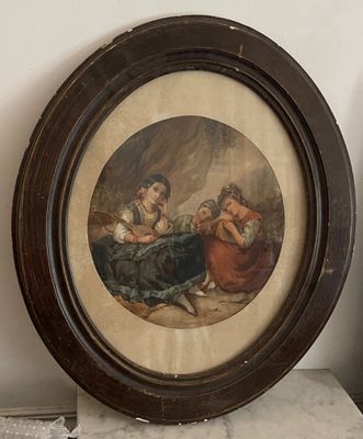 une photo d'une photo représentant une femme et deux enfants