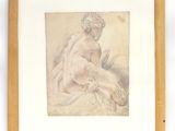 une image représentant un dessin d'une femme nue, dans un cadre en bois