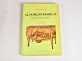 yellow book with a picture of a chest of drawers on top of it
