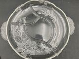 a glass plate with a flower design on it