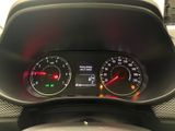 a close up of a car dashboard with a speedometer and gauges