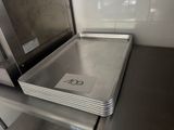 a tray with a number on it sitting on a shelf