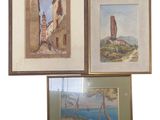 three framed paintings of a lighthouse and a lighthouse tower