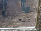 un tableau représentant un homme assis à une table avec un chien