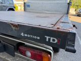 a truck that is parked on the side of the road