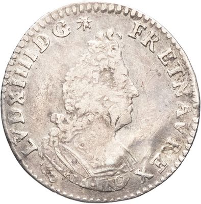 gros plan d'une pièce de monnaie sur fond blanc