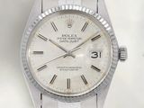an image of a rolex watch with a white dial and roman numerals