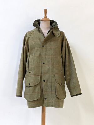 an image of a coat on a mannequin stand