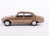 a toy car that is sitting on a white surface