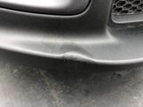 a close up of the front bumper of a car