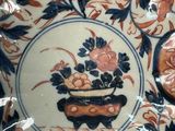 a decorative plate with a flower design on it