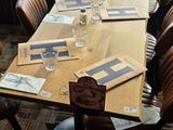 many chairs around a table in a restaurant