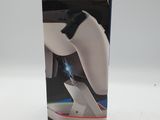 packaging of a wii controller in a box on a white surface