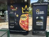 two vending machines that are on the side of the road