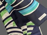 a blue and green striped umbrella with a white stripe on it