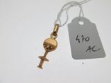 une image représentant une clé en or à laquelle est attachée une étiquette