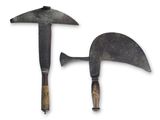 two old tools that are sitting next to each other