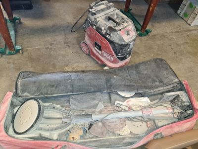 a suitcase that is sitting on the floor with tools in it