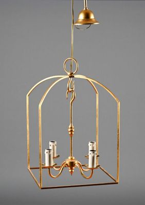an image of a brass hanging light fixture with two candles
